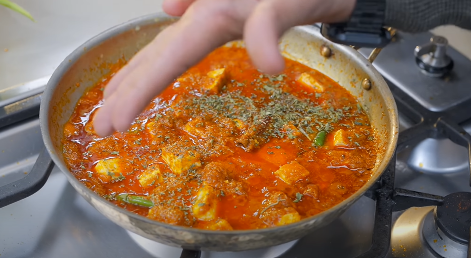 Paneer masala garnished with kasuri methi and fresh coriander