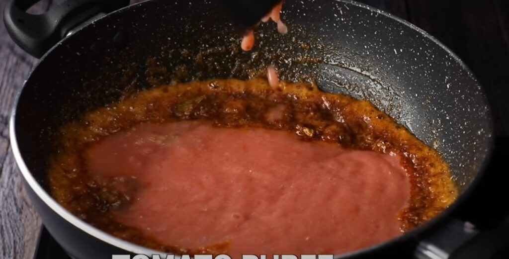 "Sautéing onions and tomatoes for curry paneer